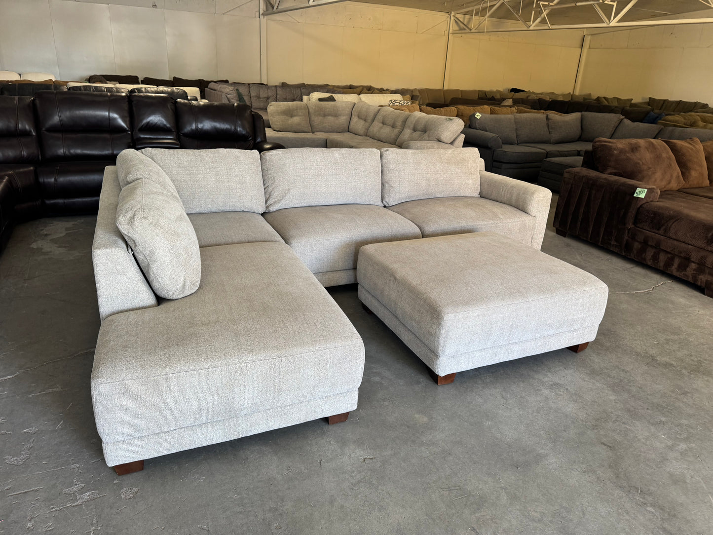 Beige L Shape Sectional Couch and Ottoman