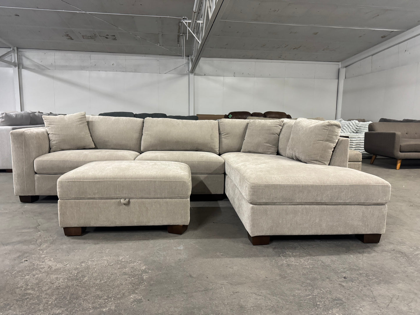 Like New Taupe Sectional with Storage Ottoman