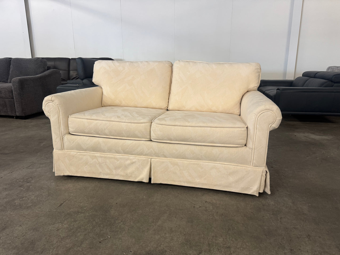 Pristine Vintage Cream Loveseat with Skirted Base