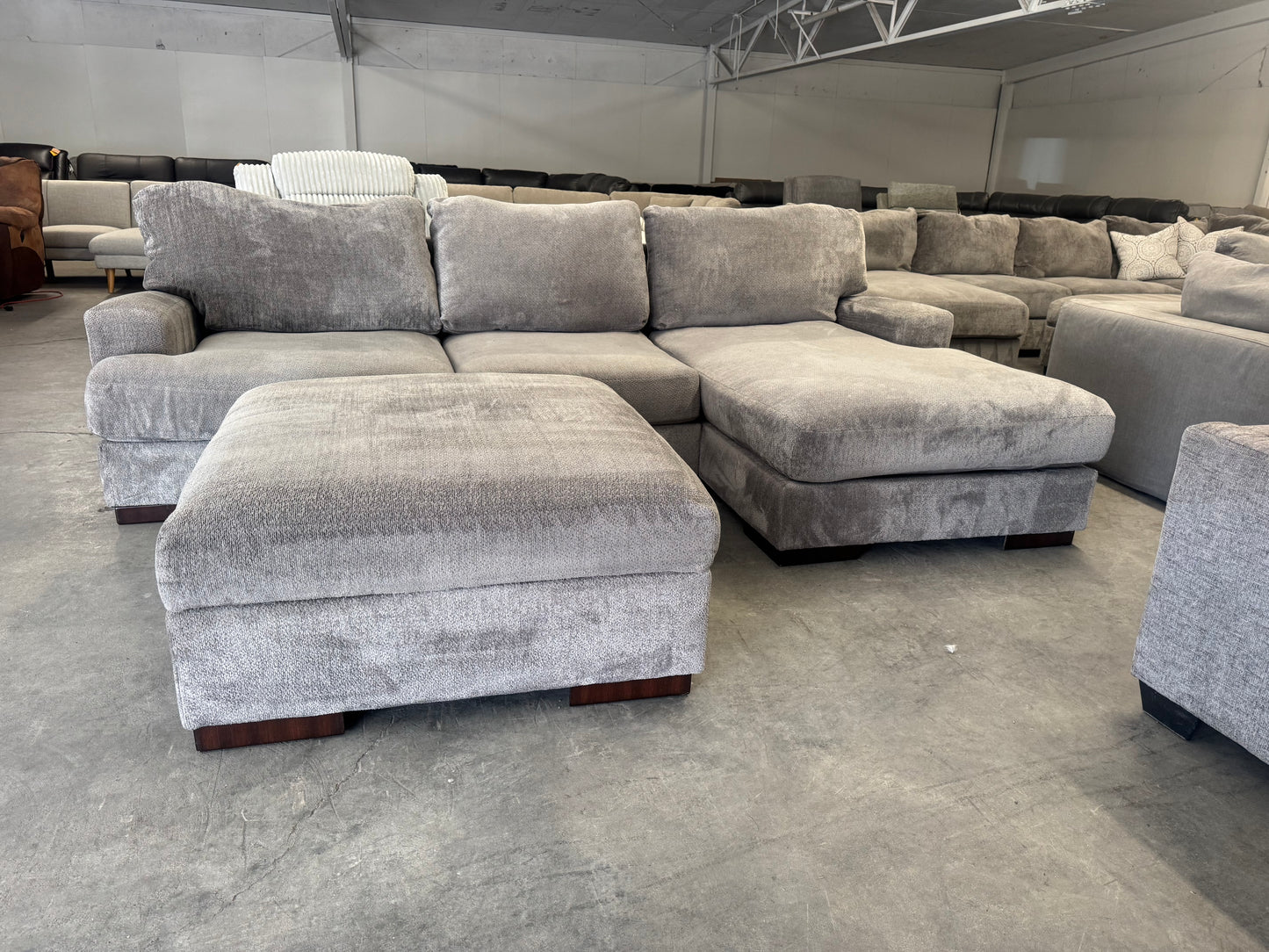 Plush Gray L-Shape Sectional with Storage Ottoman