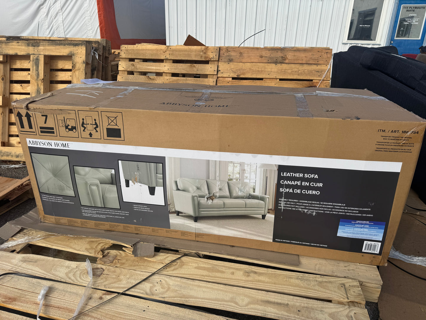 Brand New Teal Leather Abbyson Sofa