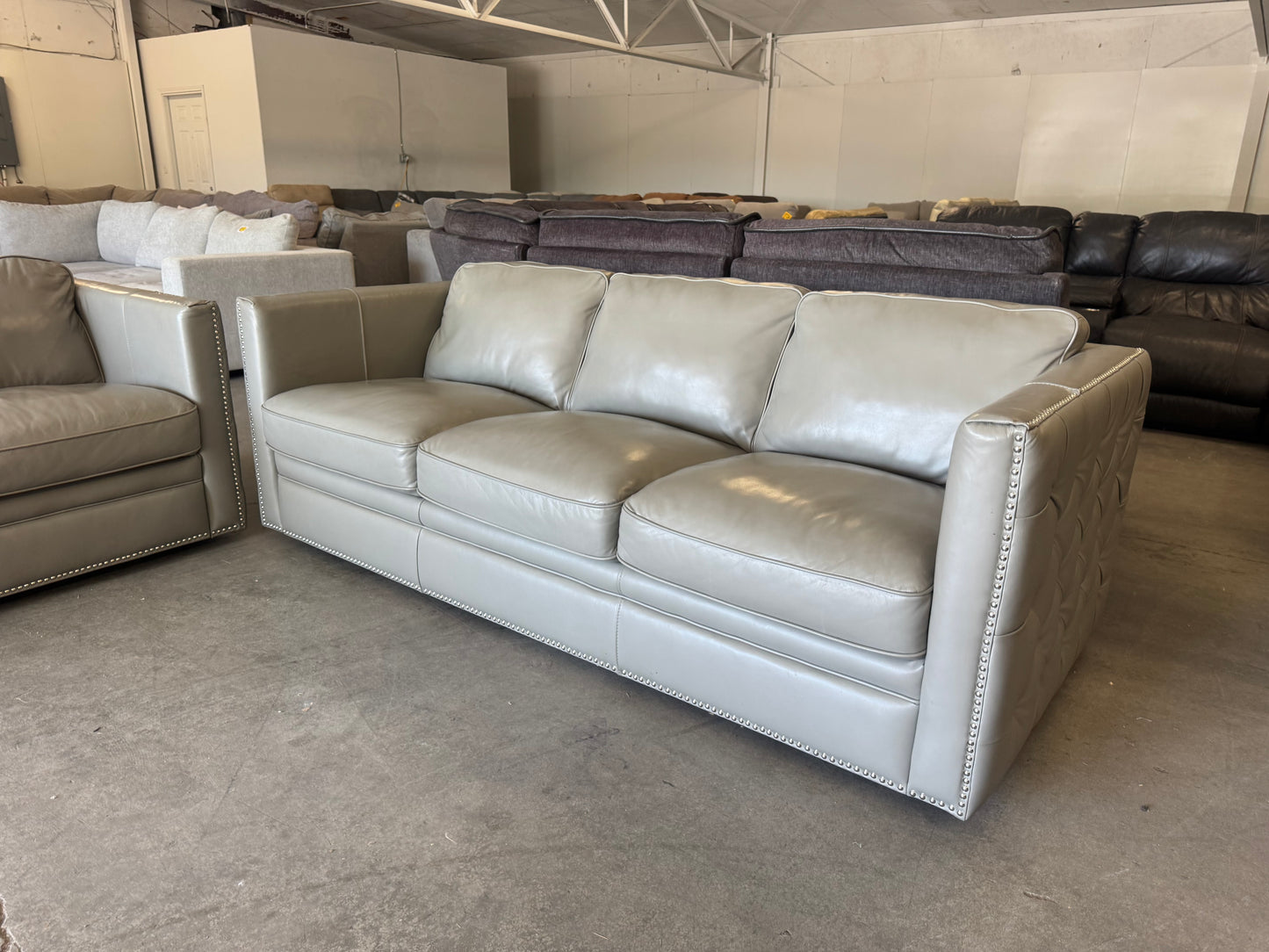 Gray Leather Couch with Ornate Nailhead Trim