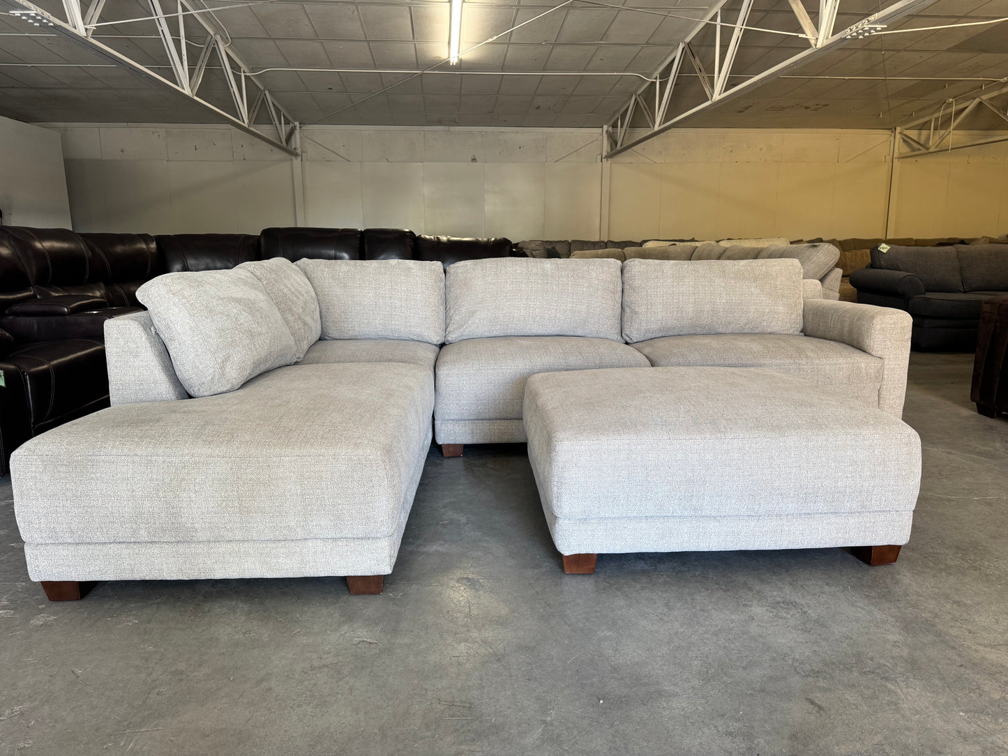 Beige L Shape Sectional Couch and Ottoman