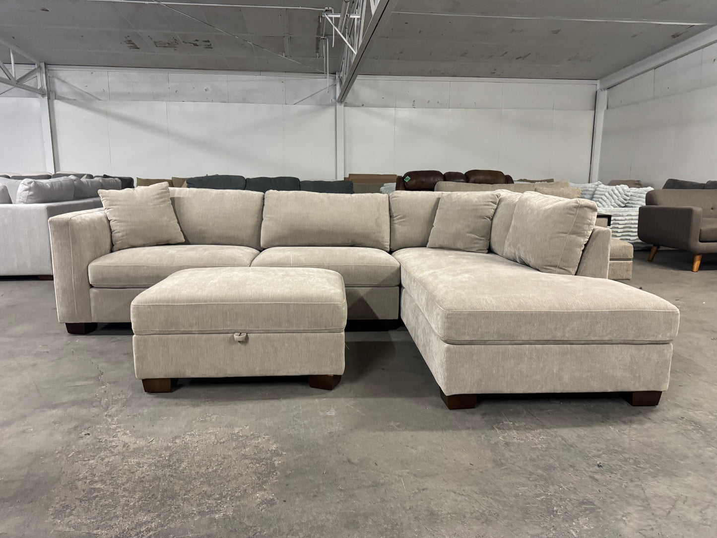 Like New Taupe Sectional with Storage Ottoman
