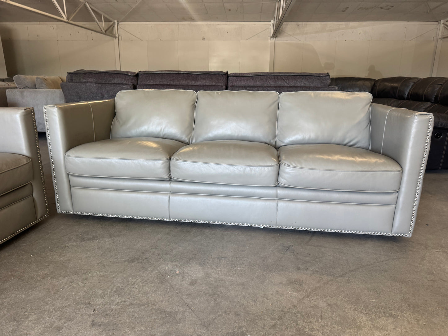 Gray Leather Couch with Ornate Nailhead Trim