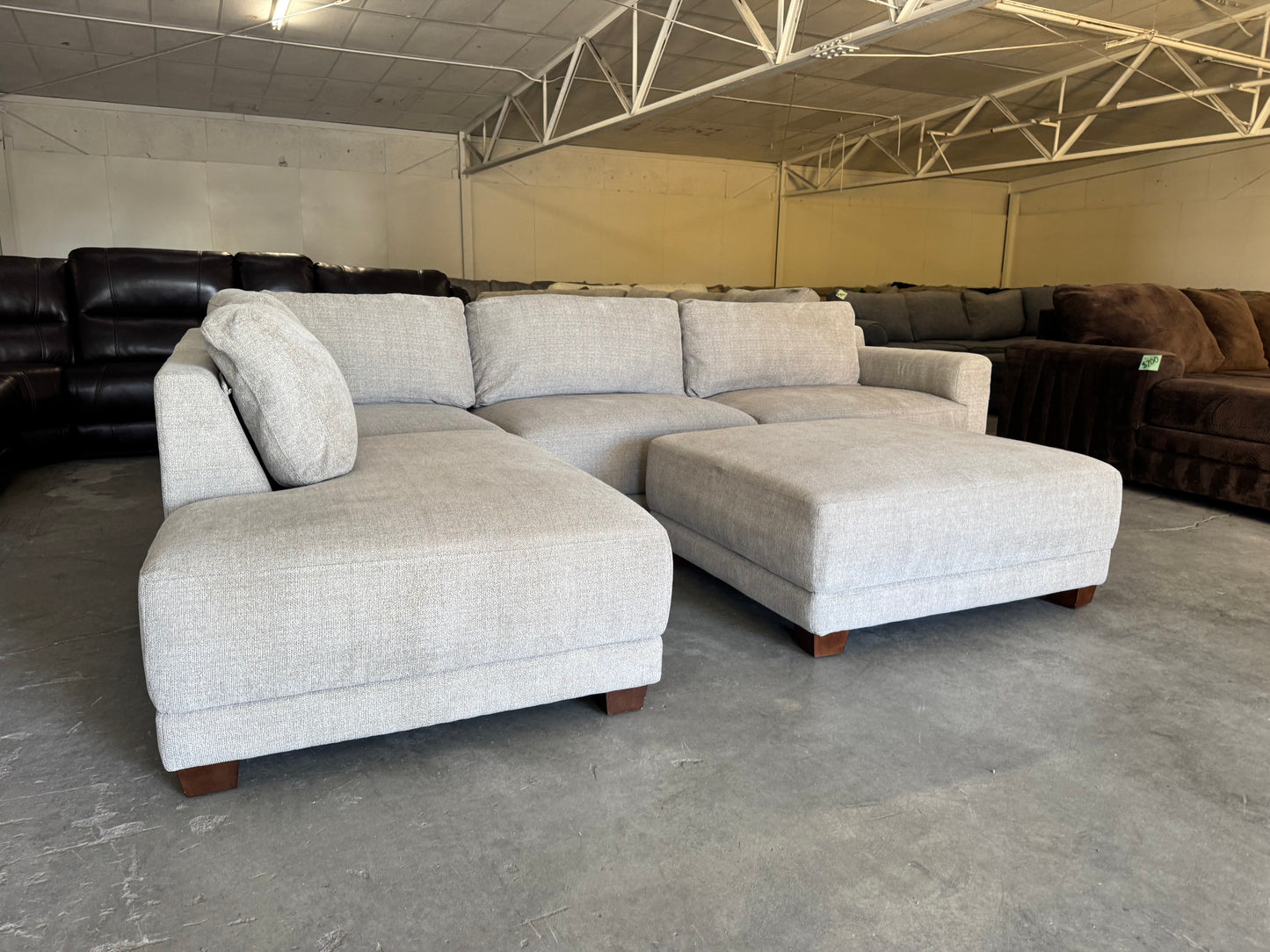 Beige L Shape Sectional Couch and Ottoman