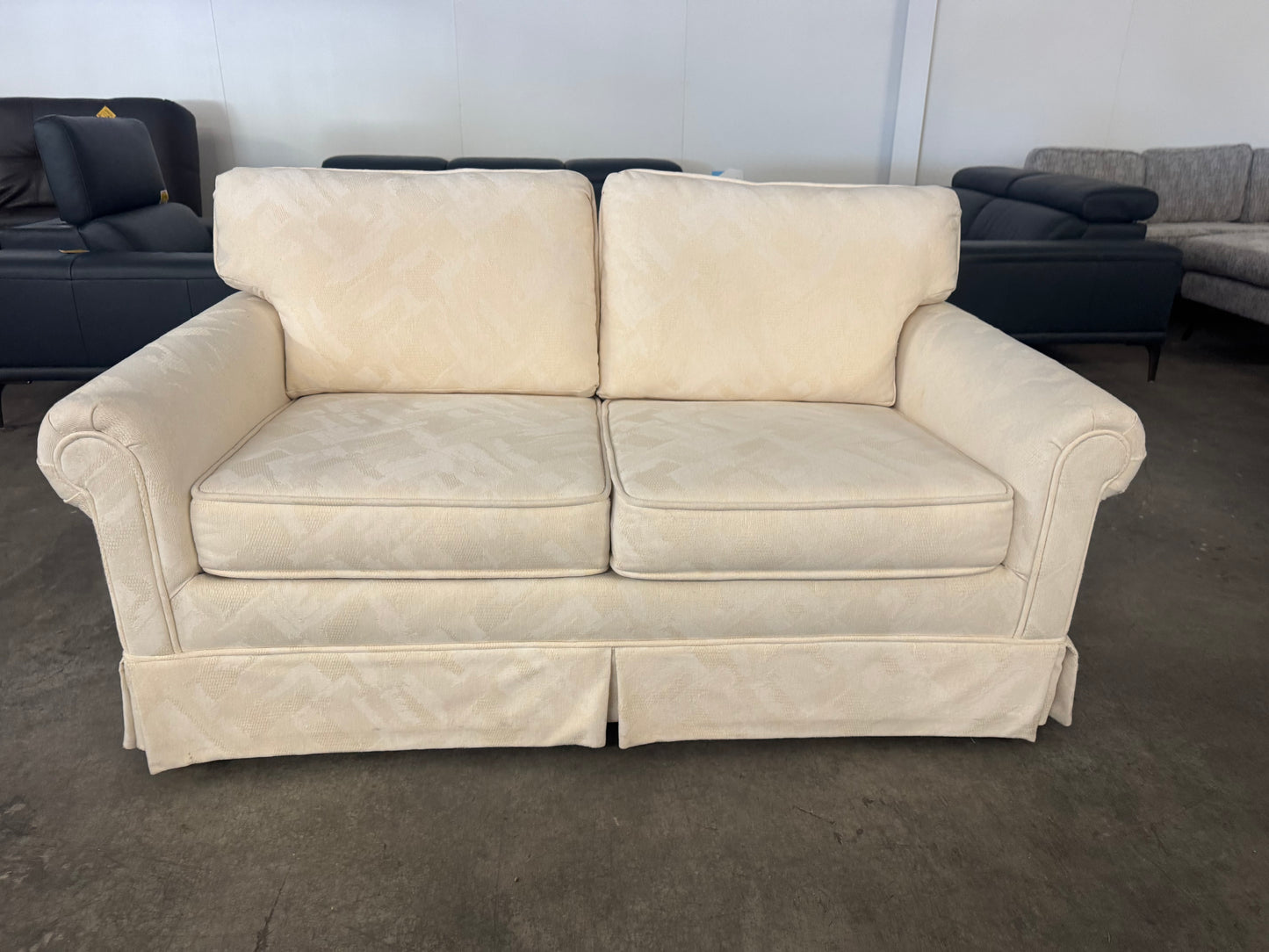 Pristine Vintage Cream Loveseat with Skirted Base