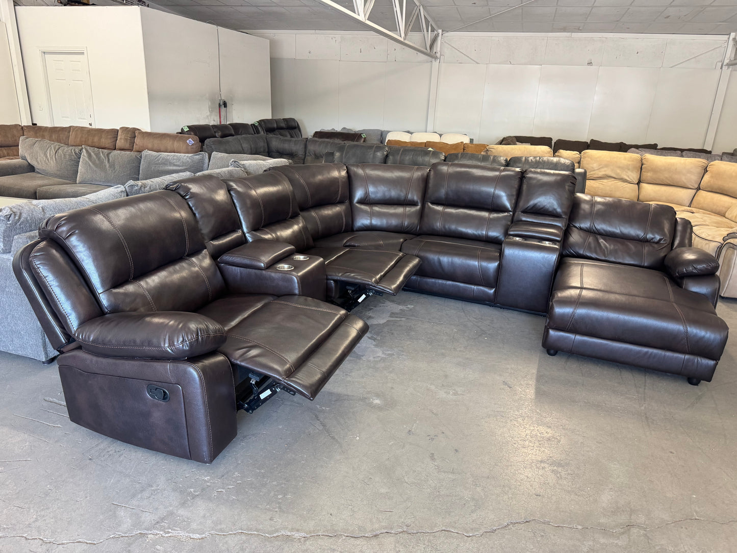 Brown Sectional with Dual Recliners and Reclining Chaise