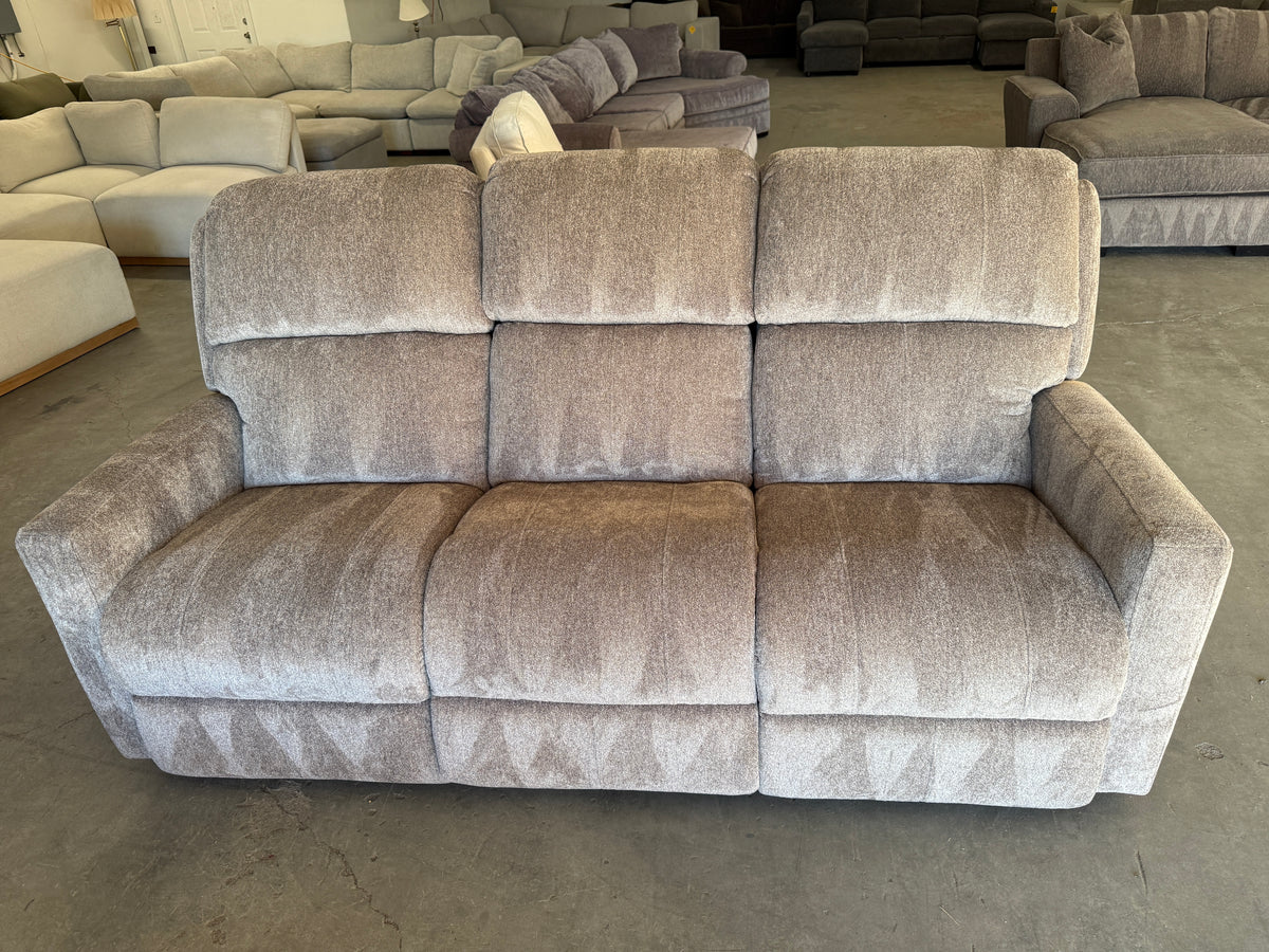 Plush Beige Reclining Sofa