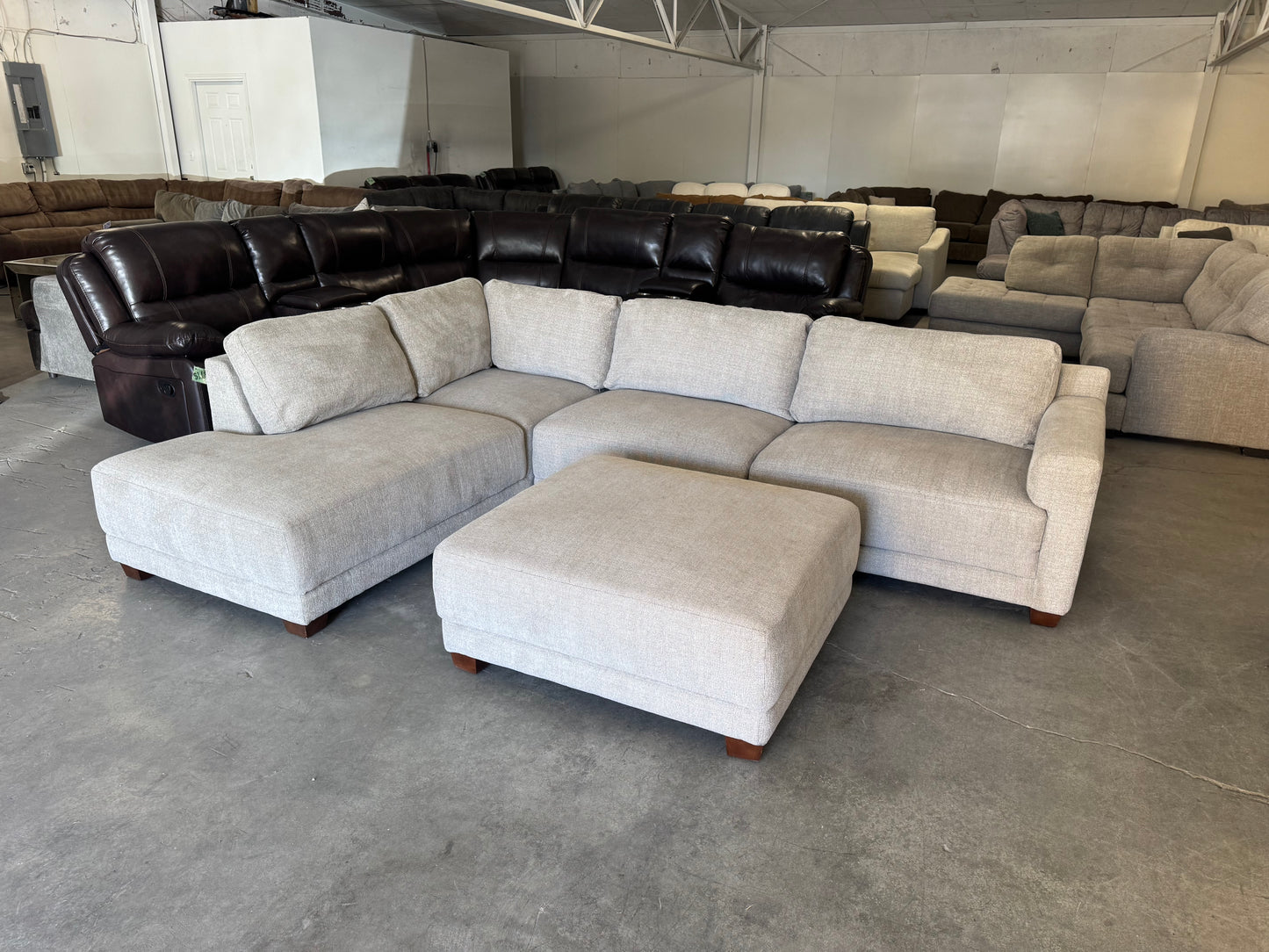 Beige L Shape Sectional Couch and Ottoman