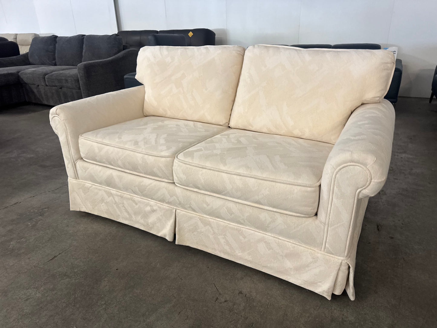 Pristine Vintage Cream Loveseat with Skirted Base