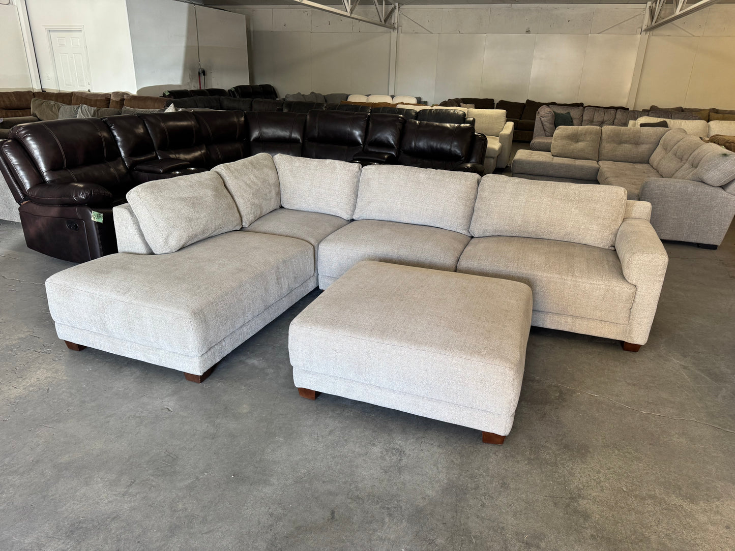 Beige L Shape Sectional Couch and Ottoman