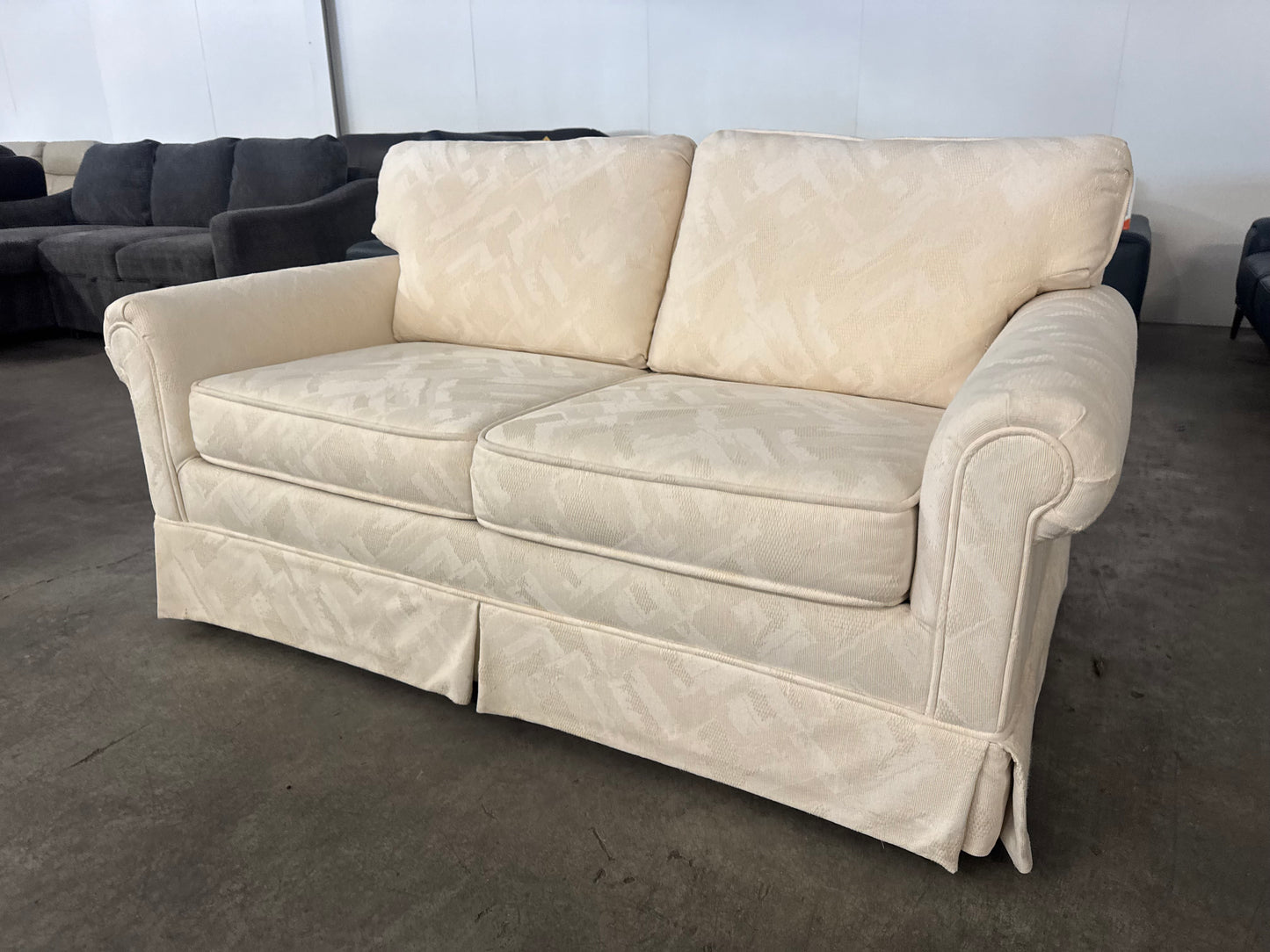 Pristine Vintage Cream Loveseat with Skirted Base