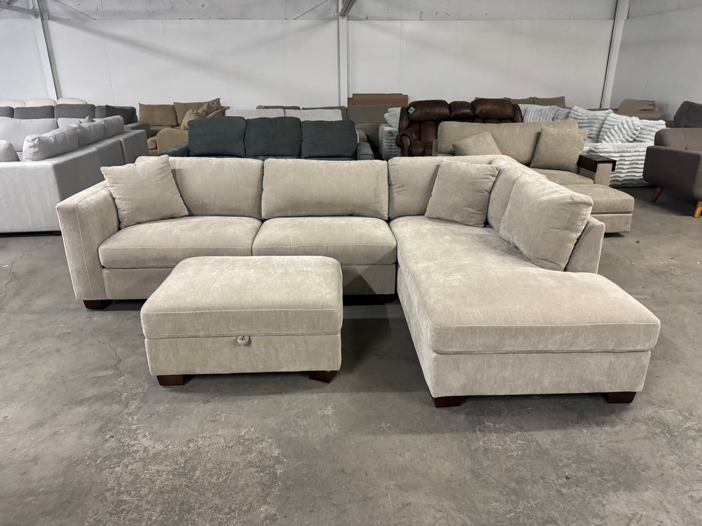 Like New Taupe Sectional with Storage Ottoman