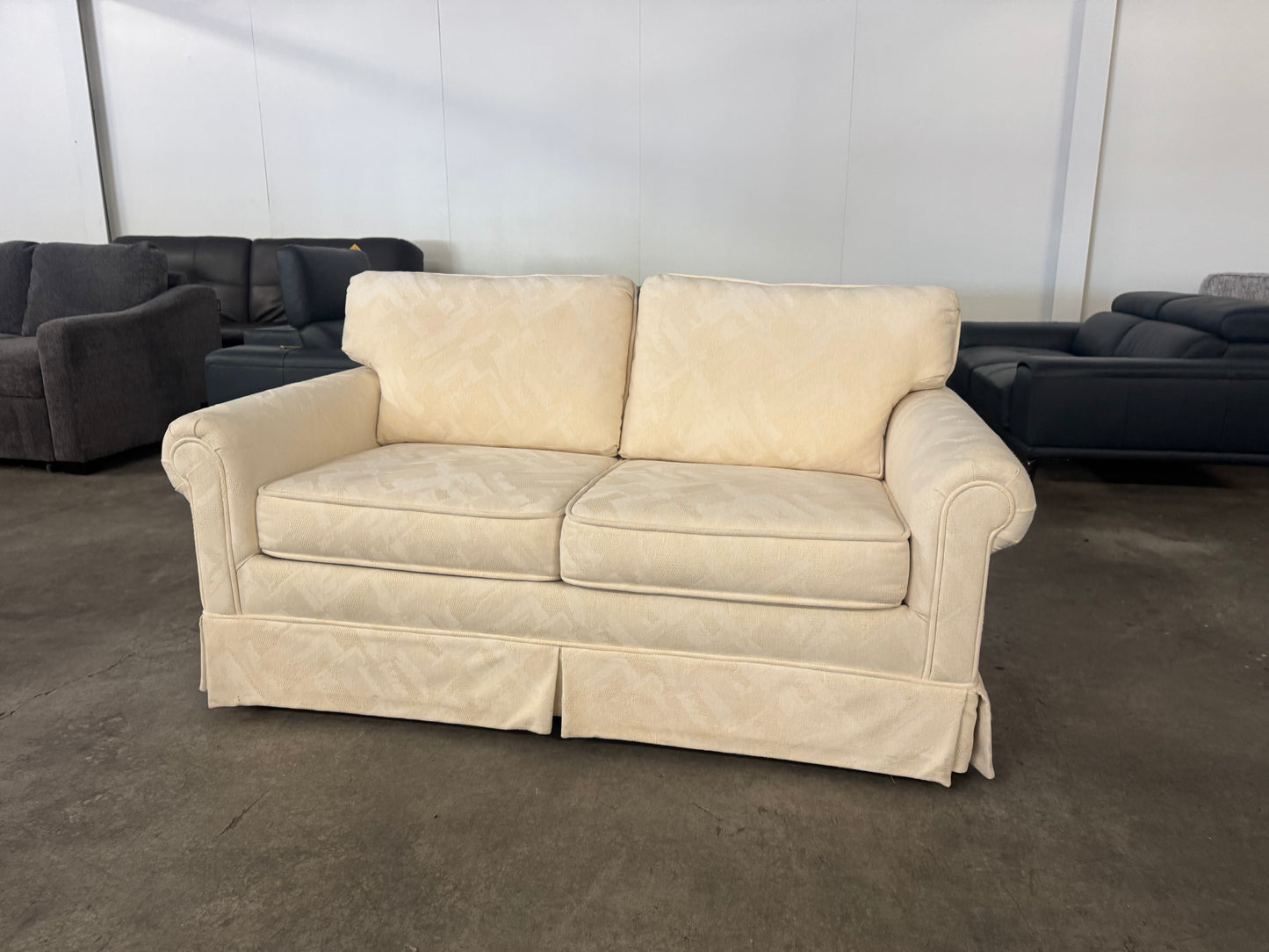 Pristine Vintage Cream Loveseat with Skirted Base