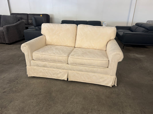 Pristine Vintage Cream Loveseat with Skirted Base
