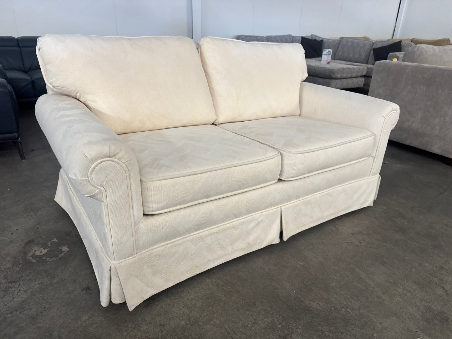 Pristine Vintage Cream Loveseat with Skirted Base