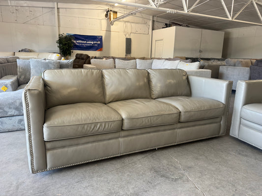Gray Leather Couch with Ornate Nailhead Trim
