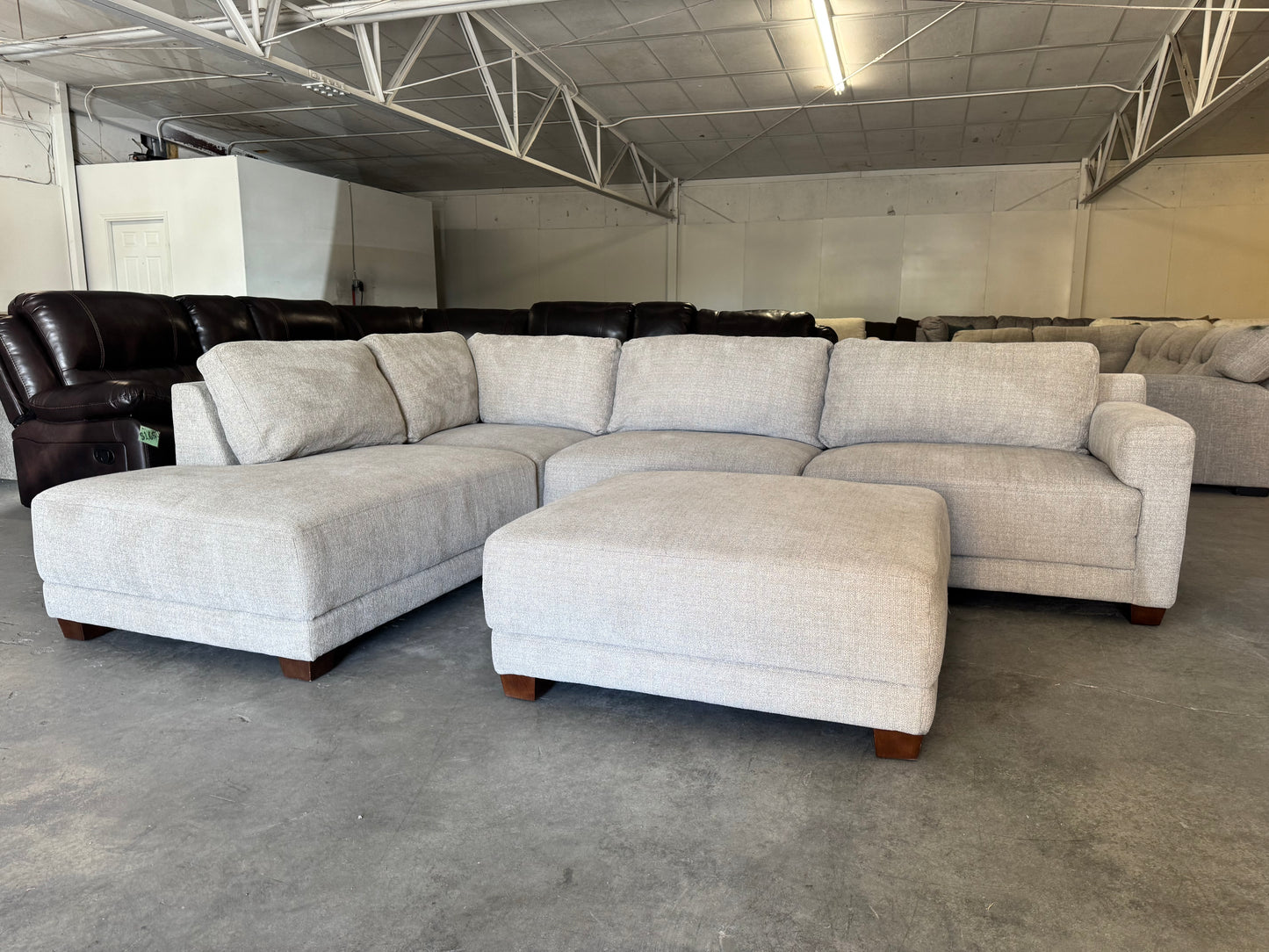 Beige L Shape Sectional Couch and Ottoman