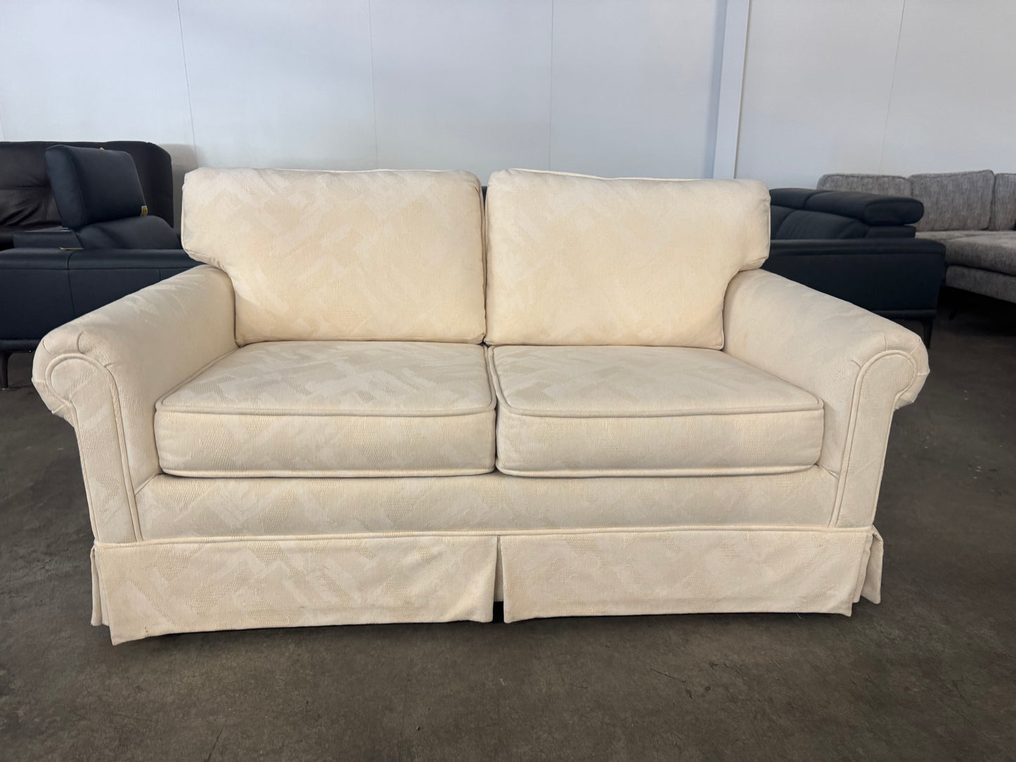 Pristine Vintage Cream Loveseat with Skirted Base