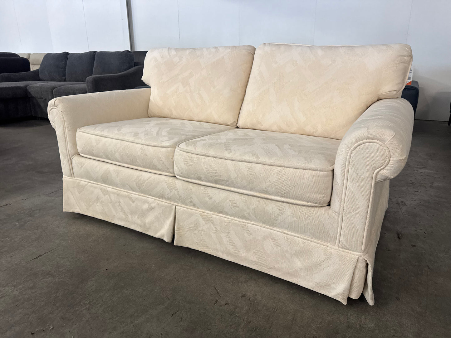 Pristine Vintage Cream Loveseat with Skirted Base