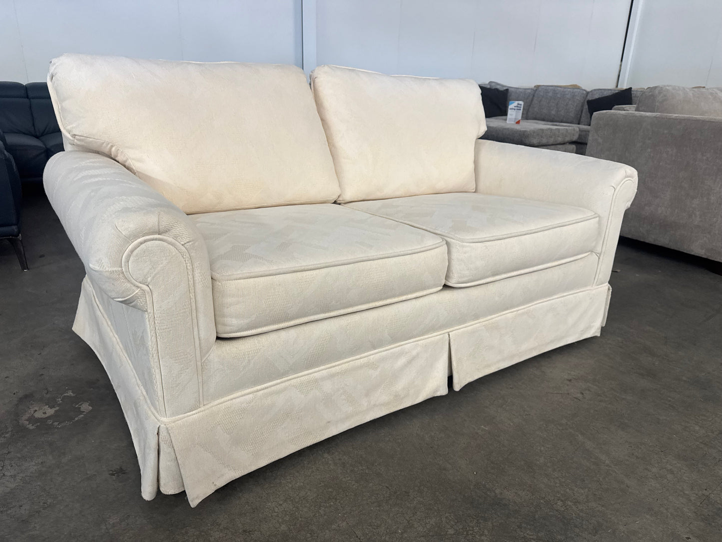Pristine Vintage Cream Loveseat with Skirted Base